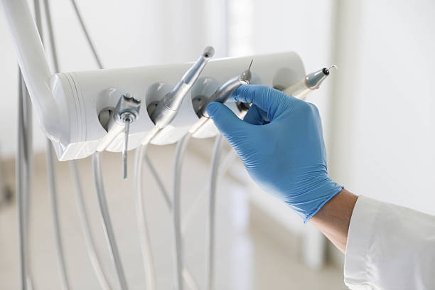 Professional Tooth Extraction technician working in Garden Grove, FL
